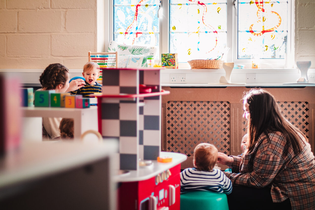 Children playing in the nursery room
