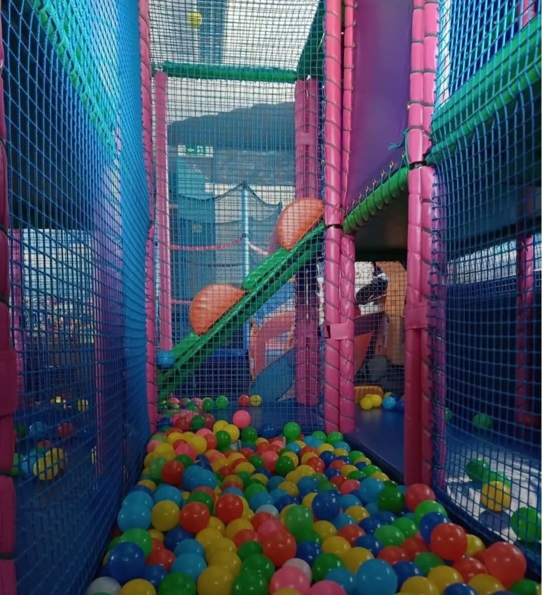 A child enjoying colourful sensory play